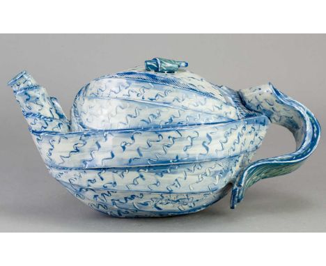 † CAROL McNICOLL (born 1943); an earthenware teapot of eccentric form, incised signature, height 15.5cm.Provenance: Purchased