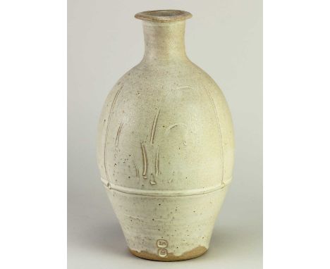 † JIM MALONE (born 1946); a stoneware bottle covered in white glaze with incised decoration, impressed JM and A (for Ainstabl