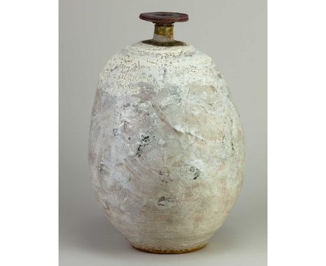† ROBIN WELCH (1936-2019); an ovoid stoneware bottle with narrow neck and disc rim covered in grey crackle glaze with crawlin