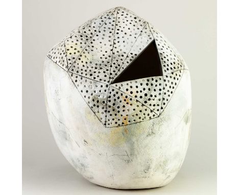 REBECCA APPLEBY (born 1979); an earthenware boulder form with a triangular aperture and perforated top covered predominantly 