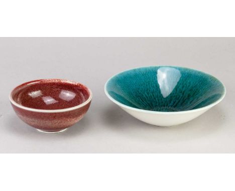 † DIANA PEYTON (born 1928); a small porcelain bowl partially covered in copper red glaze, impressed DP mark, diameter 9cm, an