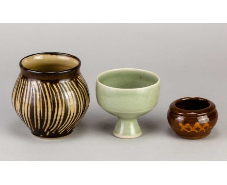 † Attributed to BERNARD LEACH (1887-1979) for Leach Pottery; a small slipware pot decorated with crosses, impressed pottery m