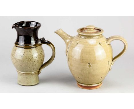 † STEPHEN PARRY (born 1950); a stoneware teapot covered in green ash glaze with incised decoration, impressed SP mark, height