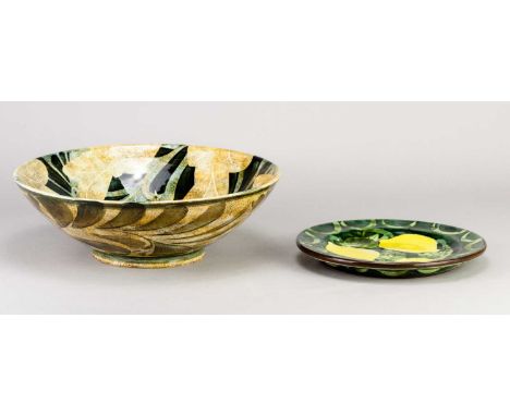 † RALPH JANDRELL (born 1965); a slip decorated earthenware bowl with an oak leaf pattern, painted RJ mark, diameter 26.5cm, a