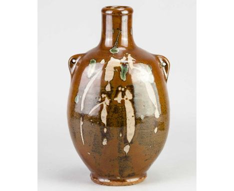 JIM MALONE (born 1946); a lugged stoneware bottle covered in kaki glaze with wax resist decoration and copper green splashes,