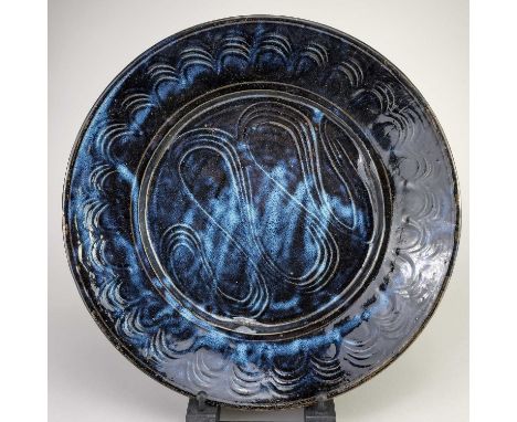 † MICHAEL CARDEW (1901-1983) for Abuja Pottery; a large stoneware dish with meander decoration, impressed MC and pottery mark