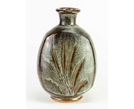 † JOHN LEACH (1939-2021) for Muchelney Pottery; a flat sided bottle covered in mottled grey and tenmoku glaze with incised de