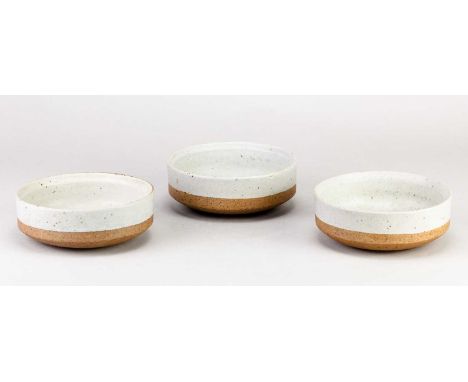 † ROBIN WELCH (1936-2019); a trio of stoneware bowls partially covered in grey glaze, impressed marks, diameter 13cm (3).Cond