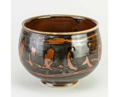 † JOHN LEACH (1939-2021) for Muchelney Pottery; a stoneware bowl covered in tenmoku, kaki and blue/grey glaze with wax resist