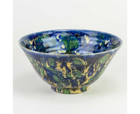 † JANICE TCHALENKO (1942-2018); a deep stoneware bowl covered in polychrome glaze, gallery sticker, diameter 23.5cm. Conditio