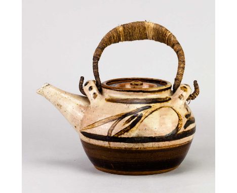 † MICHAEL CARDEW (1901-1983) for Winchcombe Pottery; a large slipware teapot with metal handle covered in galena and iron gla