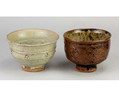 JIM MALONE (born 1946); a stoneware bowl covered in tenmoku breaking to kaki glaze with impressed decoration, impressed JM an