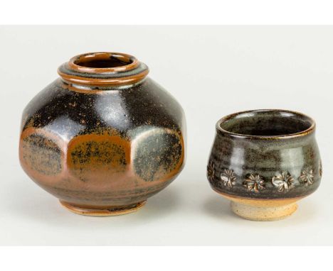 † JOHN LEACH (1939-2021) for Muchelney Pottery; a part faceted stoneware jar covered in tenmoku breaking to kaki glaze, impre