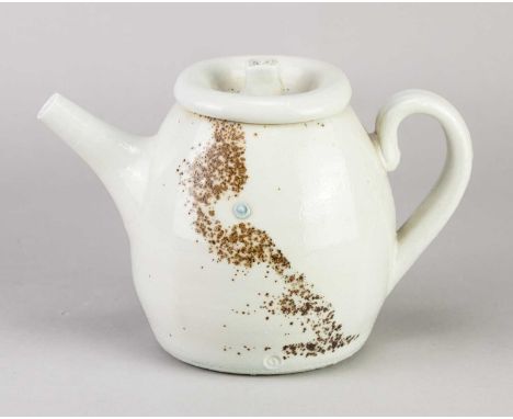 † JACK DOHERTY (born 1948); a porcelain teapot covered in soda vapour glaze, impressed mark, heigjt 13cm.Condition Report: Ap