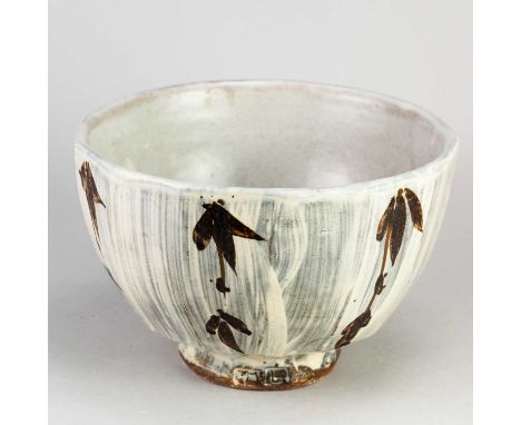 JIM MALONE (born 1946); a deep faceted stoneware bowl covered in brushed slip with iron decoration, impressed JM and L (for L