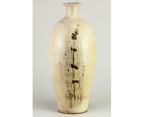 † JIM MALONE (born 1946); a tall stoneware bottle covered in cream glaze with incised and iron decoration, impressed JM and A