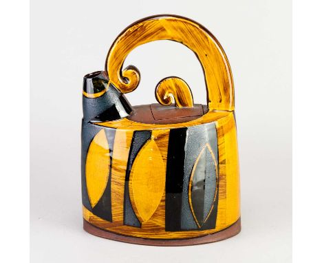 † RICHARD PHETHEAN (born 1953); a slip decorated earthenware teapot, painted RP mark, height 22.5cm. Condition Report: Appear