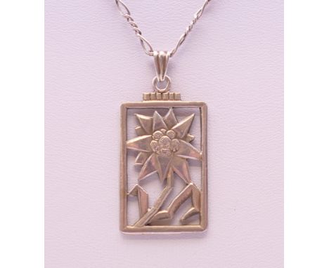 An Art Deco silver Edelweiss Flower pendant stamped 935, on chain. The pendant 3.5 cm high. 