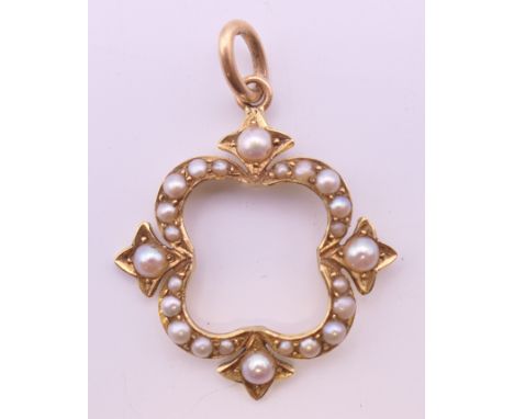 A Victorian 15 ct gold seed pearl pendant. 2.5 cm high.