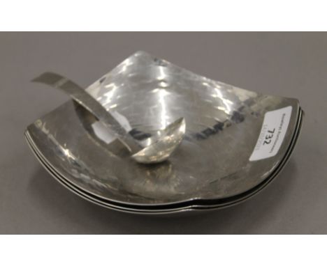 KESWICK SCHOOL OF INDUSTRIALS ARTS, three bowls and a ladle. The bowls 14 cm wide.