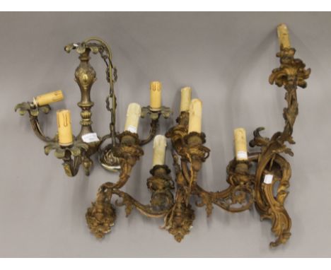 Three wall sconces and a hanging light. The latter 31 cm high.