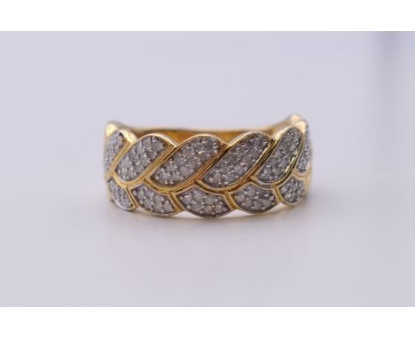 A silver gilt leaf ring. Ring size R/S.