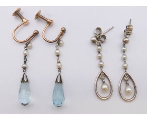Two pairs of seed pearl earrings. The largest 2.5 cm high.