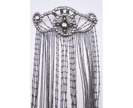 An Art Deco headdress. Approximately 83 cm long.