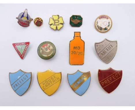 A quantity of enamel badges. 