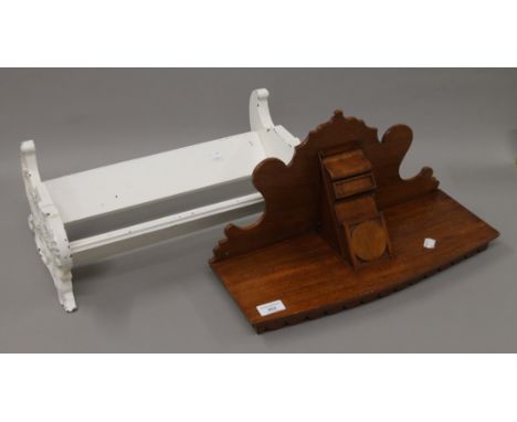 A Victorian walnut wall bracket and white painted book rack. The former 46 cm wide.
