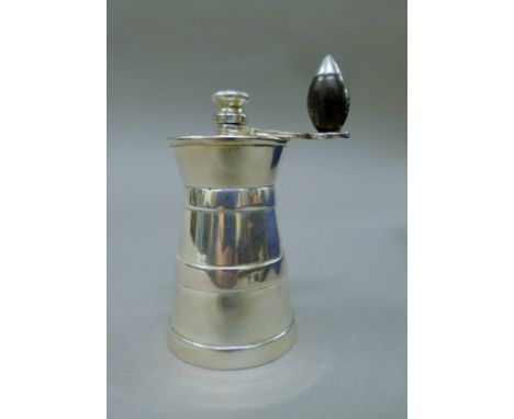 A Mappin &amp; Webb silver plated milk churn form grinder. 10 cm high.