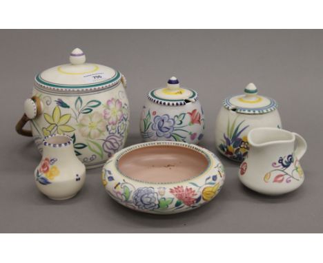 A small quantity of Poole pottery. The largest 14 cm high.