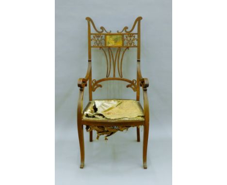 An Art Nouveau mahogany open armchair. 51.5 cm wide.