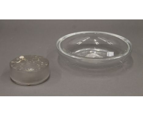 An R Lalique glass powder pot and a Lalique style glass dish. The former 8.5 cm diameter.