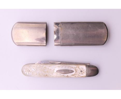 A silver and mother-of-pearl folding fruit knife (10.5 cm long extended) and a match holder. 