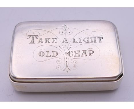 A Victorian silver vesta box inscribed to one side 'Take a Light Old Chap', the other side inscribed 'Fidelis ad Urnam' and w