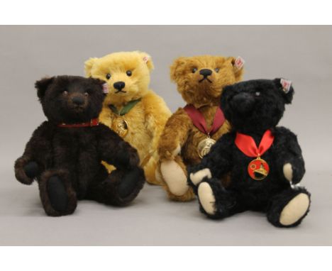 Four Steiff teddy bears, each housed in a Steiff display case - 2011 Bear of the Year, 2012 Bear of the Year, 2012 RMS Titani