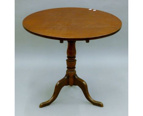 A 19th century mahogany tilt top tripod table. 80 cm diameter.