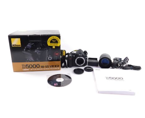 A Nikon D5000 Digital camera, 18-55 VR kit, with an AF-S Nikkor 18-55mm 1:3.5 - 5.6G lens, boxed with users manual and access