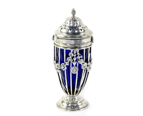 A Victorian silver sugar sifter, with a wire work body, overlaid with embossed swags of flowers, with blue glass liner, Hasel