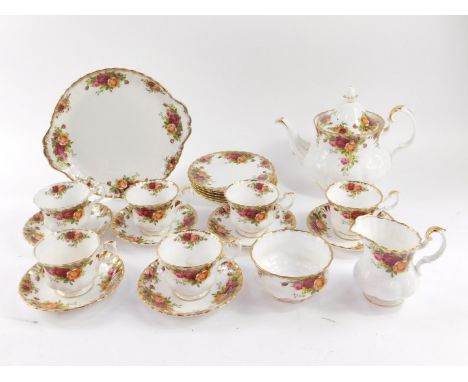 A Royal Albert porcelain part tea service, decorated in the Old Country Roses pattern, comprising teapot, bread plate, cream 