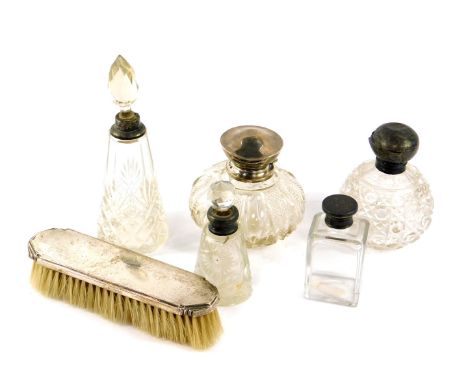 A George V cut glass scent bottle, with cut glass stopper, silver mount and hinged lid, Birmingham 1910, further cut glass sc