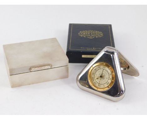 A George VI silver cigarette box, with engine turned decoration, London 1949, 7.72oz all in, 11cm W, 9cm D, together with The