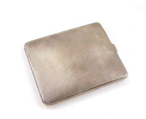 A George V silver cigarette case, with engine turned decoration, internally presentation engraved, part erased, Birmingham 19