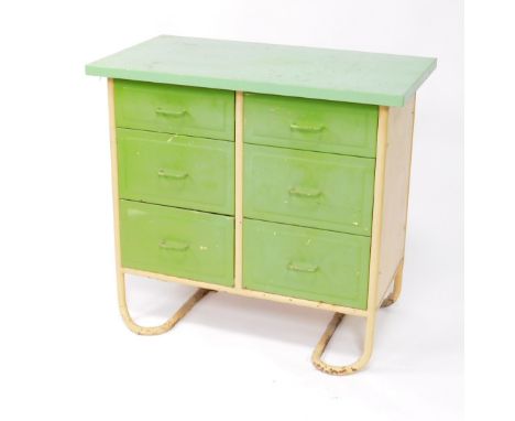 A Dean Bros of Nottingham mid 20thC cream and green painted metal and enamel kitchen chest, the rectangular top over six grad
