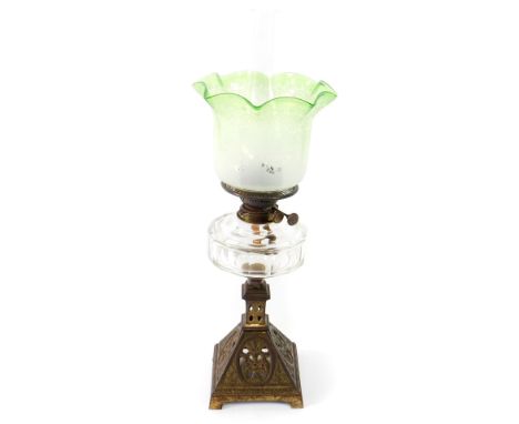 A Rippingilles duplex no 3 brass oil lamp, with a clear glass reservoir, chimney, and etched clear to green glass shade, 62cm