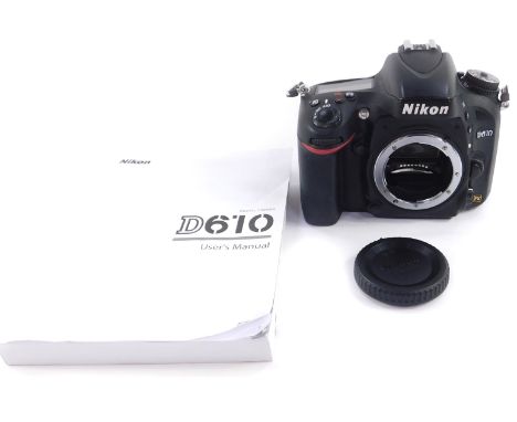 A Nikon D610 Digital camera, with users manual, unboxed.