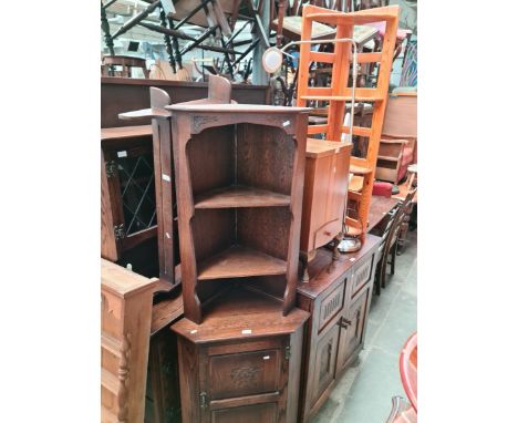 Various items of furniture; an oak and leaded glass dresser, an oak side cabinet, pine corner shelves, an oak corner cabinet,