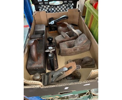 A box of tools to include Stanley planes. 