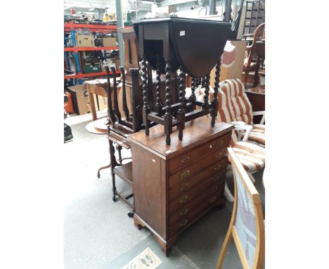 Eight items of furniture comprising an oak chest of drawers, a bureau, a gate leg table, a trolley, a nest of tables, a magaz